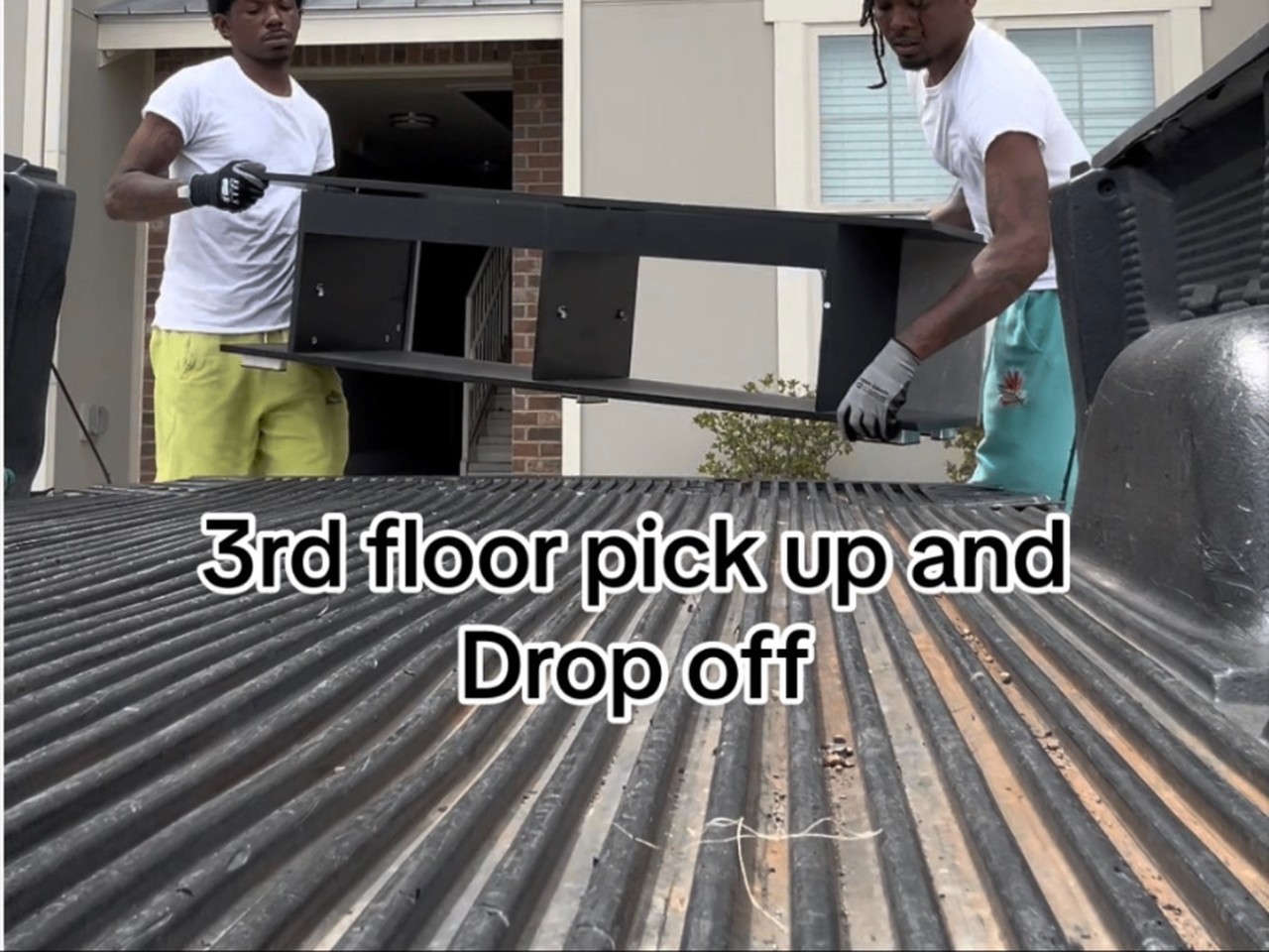 Movers doing a 3rd floor apartment pickup and drop-off